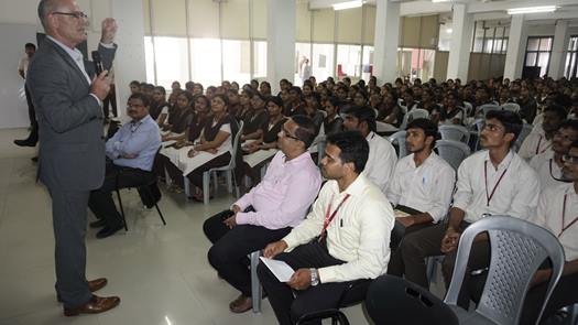 Prof. Gregory Collier interatcing with students min